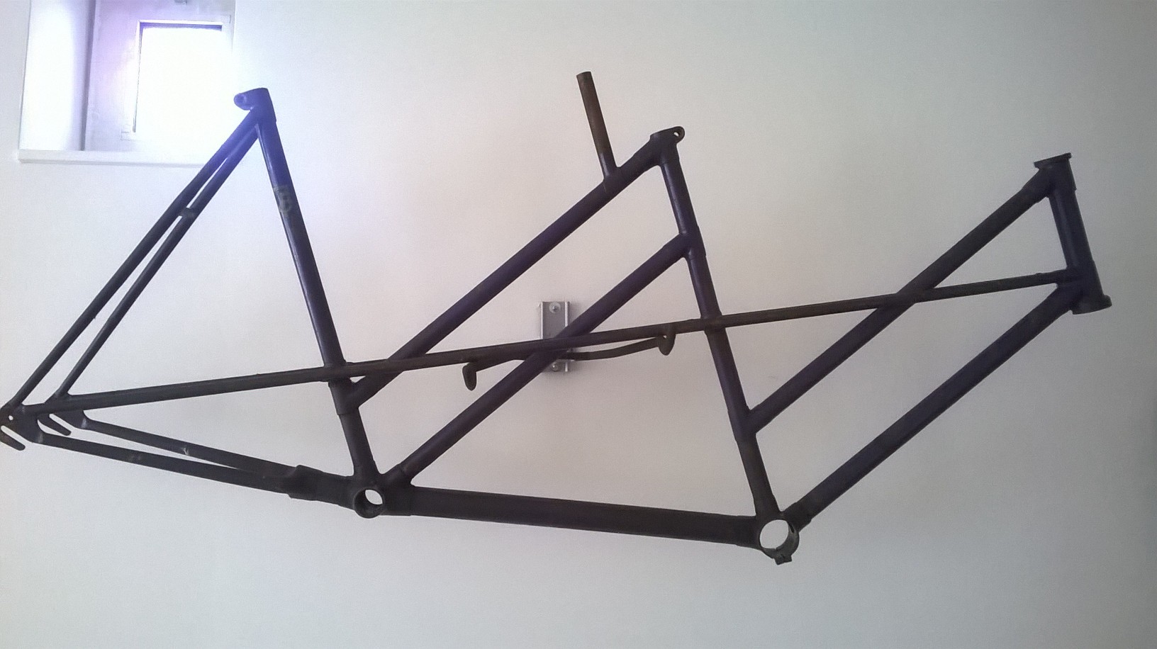 kettingspanner / lokatie voorste trapas