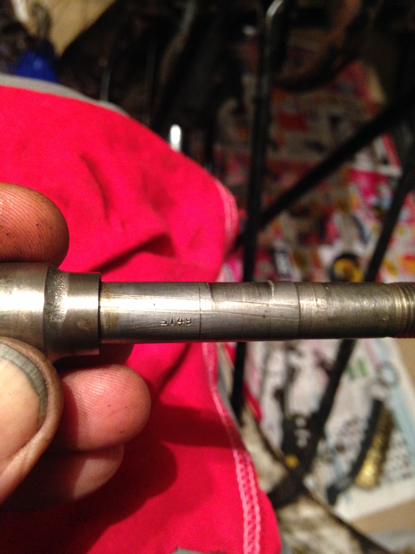 Styria onderdeel, gemarkeerd: ST49 (vermoedelijk Styria 1949).