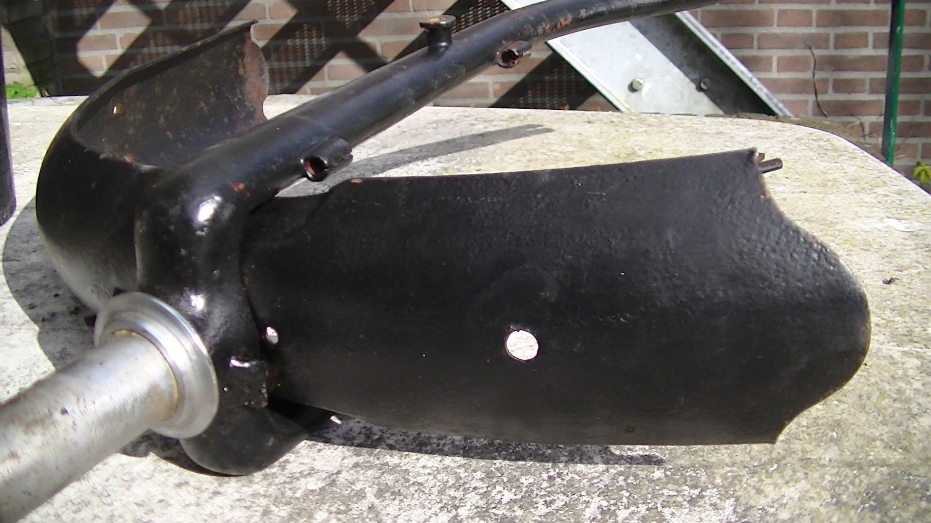 Gat bovenop voorspatbord