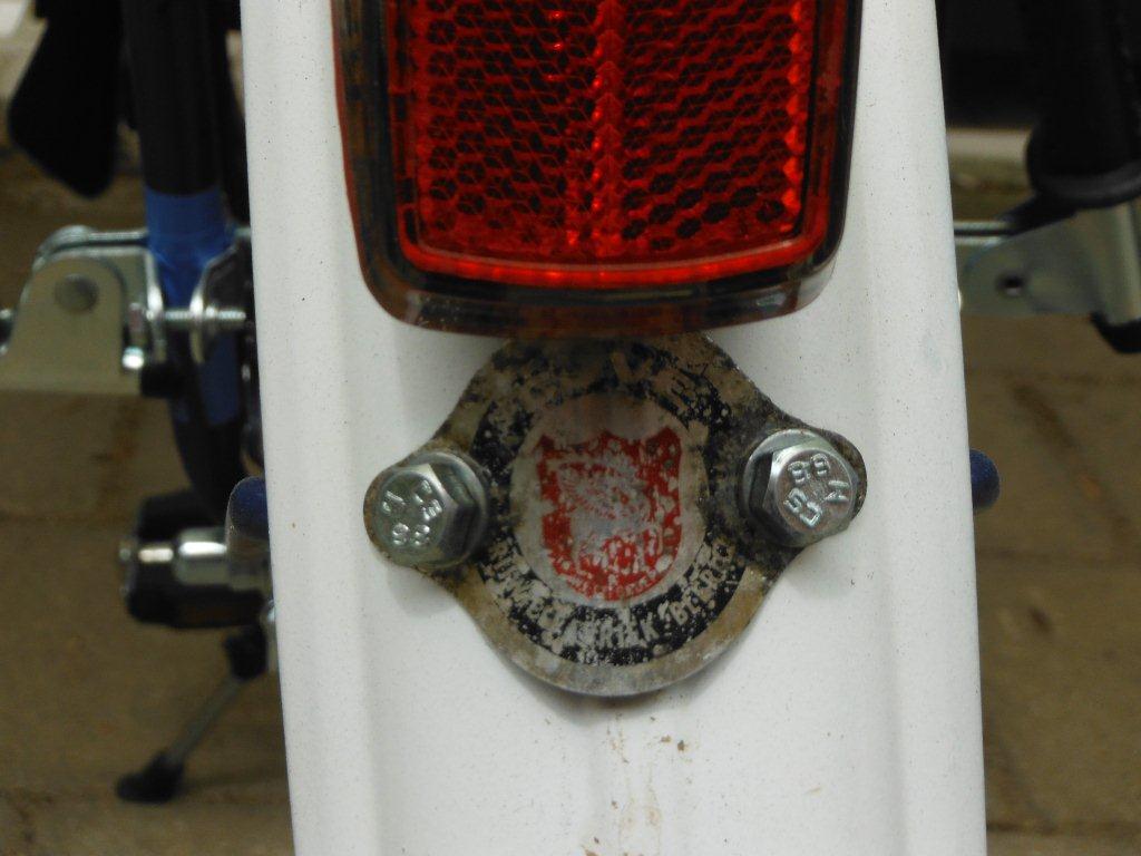 het naamplaatje achterzijde