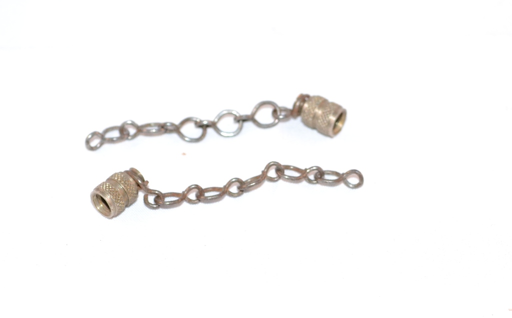 Dopjes met kettinkjes voor de ventielen